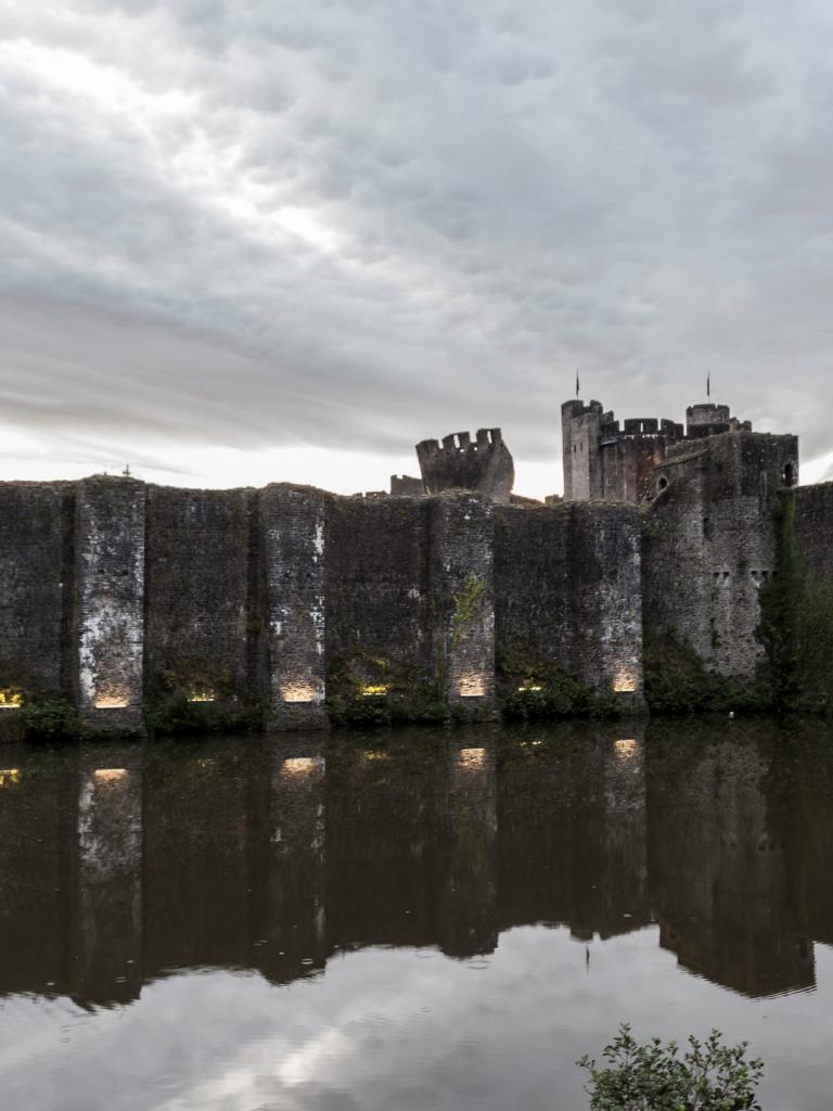Image of Caerphilly castle in the dusk light