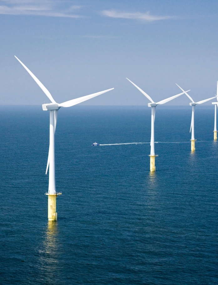 A wind farm in the sea.