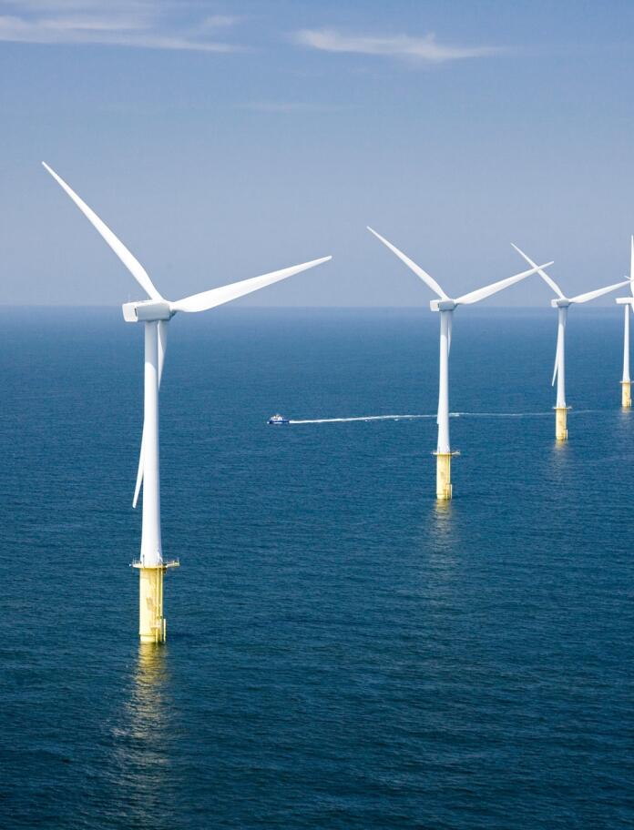 A wind farm in the sea.