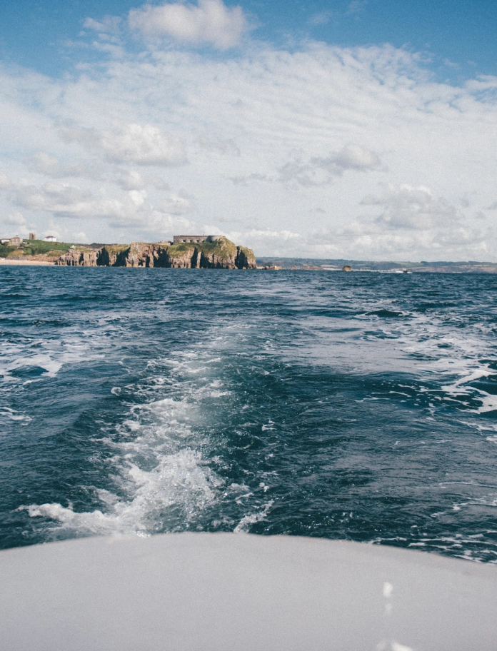 Wake of a boat sailing off the coast of Tenby