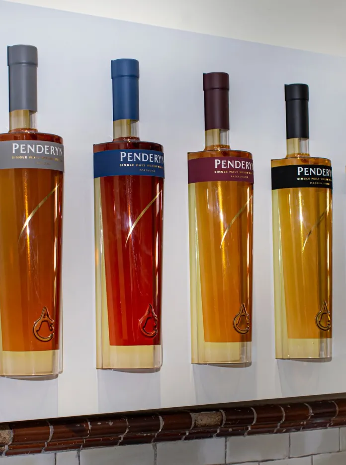 Bottles of whiskey in a show case.