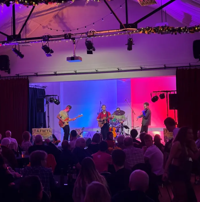 A band playing on a stage