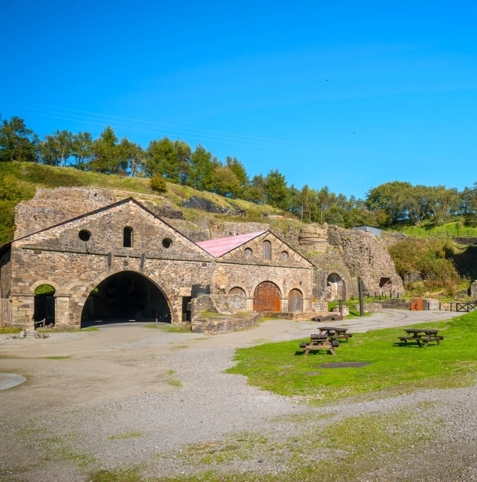 Some old brick buildings in a historical industrial setting