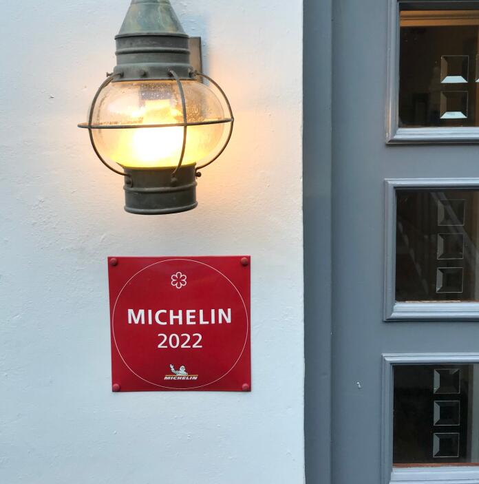 The front door of The Whitebrook with the Michelin 2022 sign.