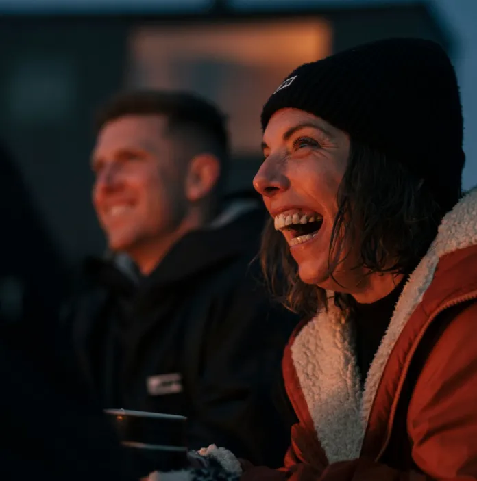 Two people smiling.