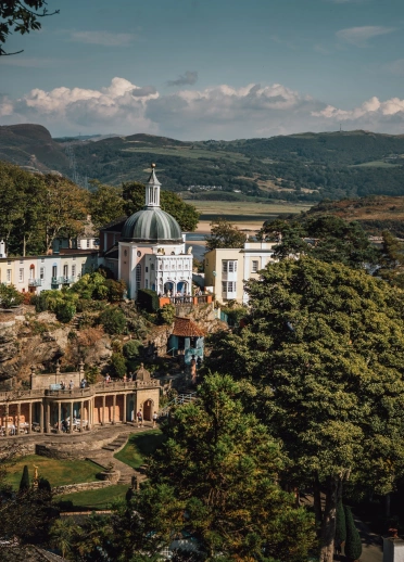 A view of Portmeirion Village next to the sea