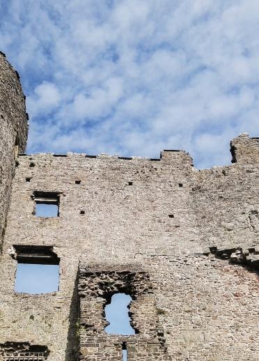 Laugharne Castle walls looking up to the sky