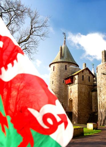 view across to Castell Coch, with Welsh flag in the foreground.
