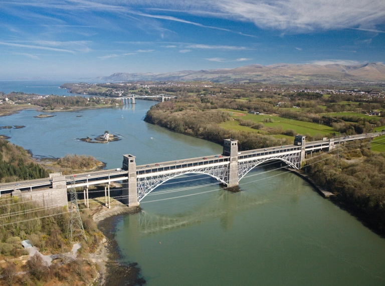 A bridge crossing a large river.