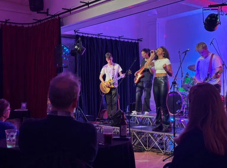 A band playing on a stage