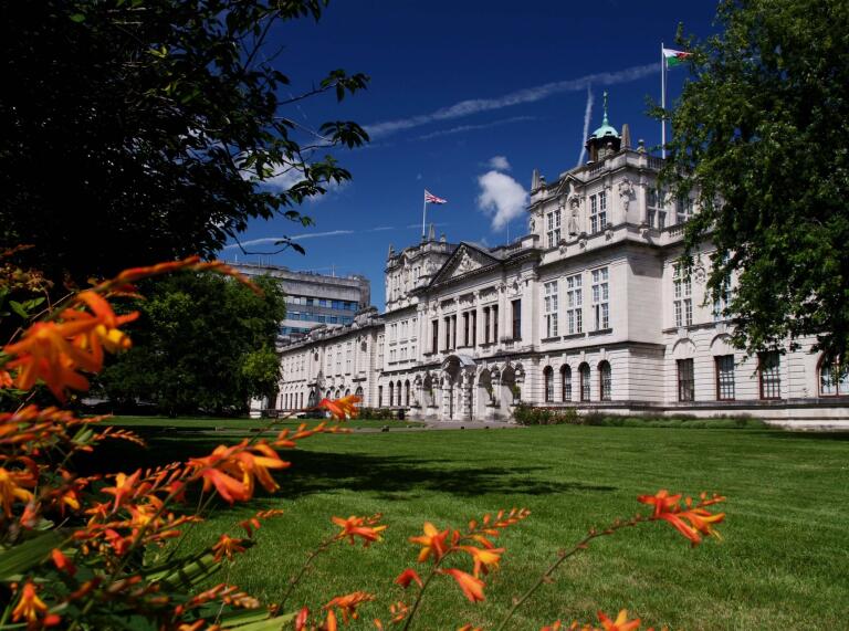 Cardiff University's main building as shown from the outside on a bright sunny day