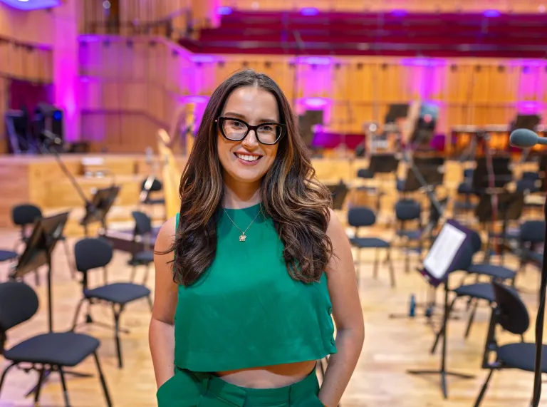 Katie Jenkins smiling at the camera at Hoddinott Hall