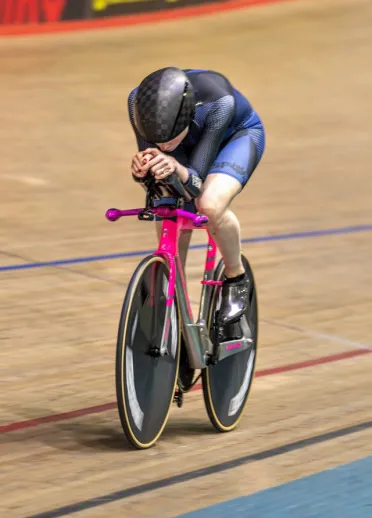 Ciara on her bike with her head down