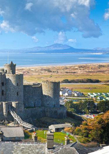 General view from the east looking out over coast Harlech Castle