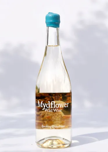 A bottle of Mydflower Wild Wine against a white background