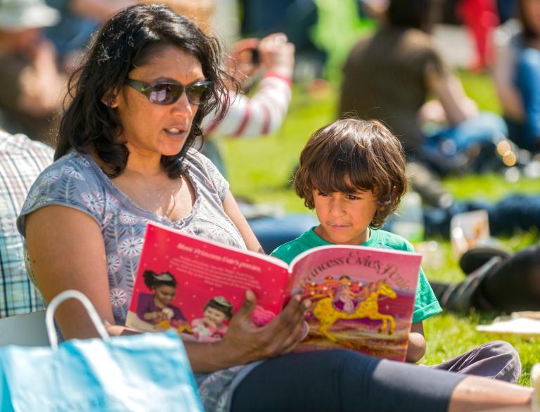 Mother and child reading a book, Hay Festival