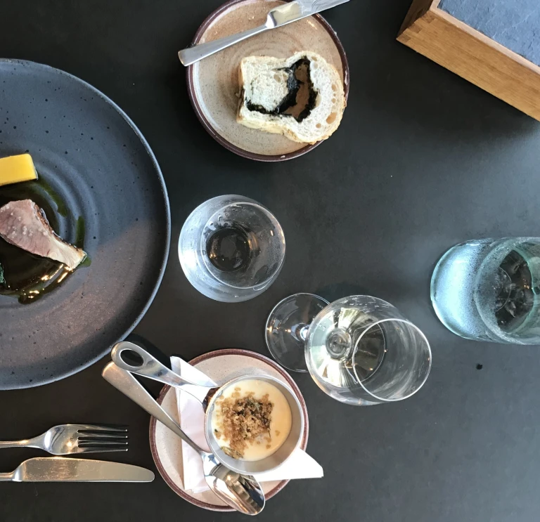 table with food and drinks.