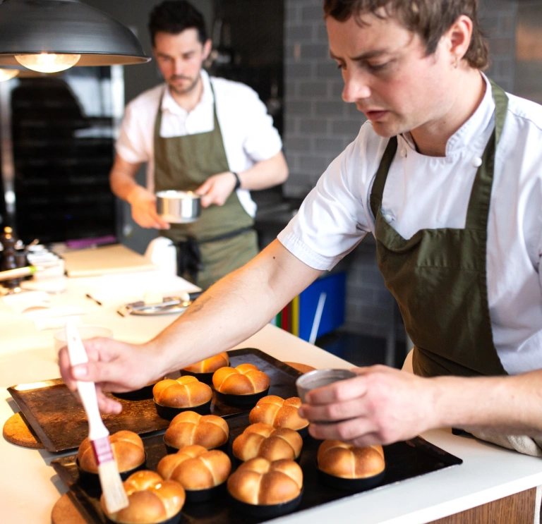 Two chefs in a kitchen 