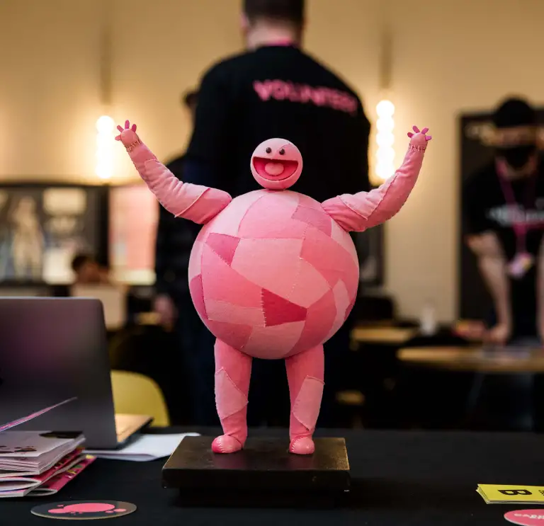 A model of a pink cartoonish creature on display at the Cardiff Animation Festival.