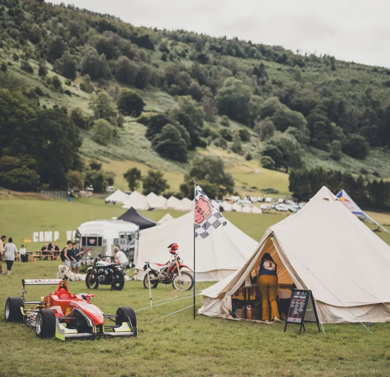A view of the campsite at Camp VC, with tents and motorbikes