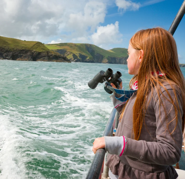 Girl looking out to sea Near New Quay, Dolphin watching, Ceredigion Heritage Coast