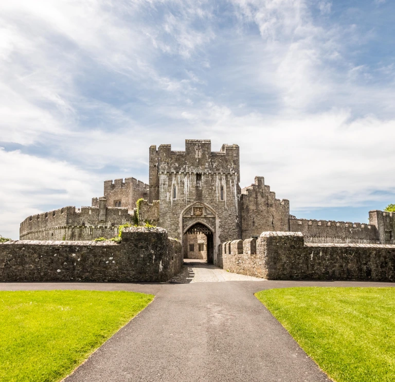 Exterior shot of the entrance to an old castle.