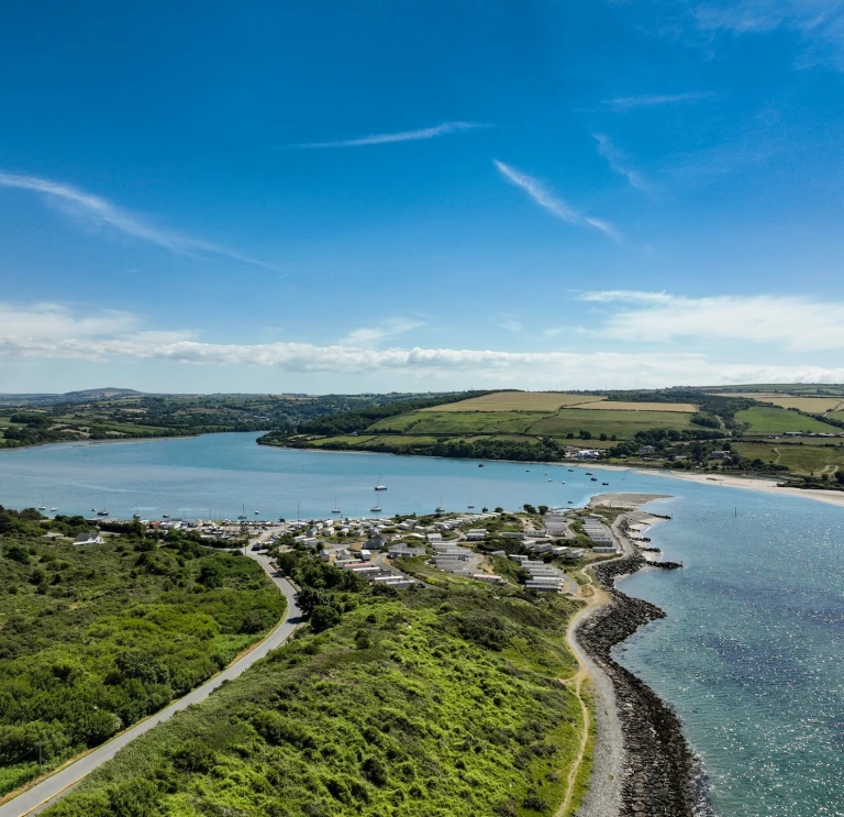A view of the estuary surrounded by land.