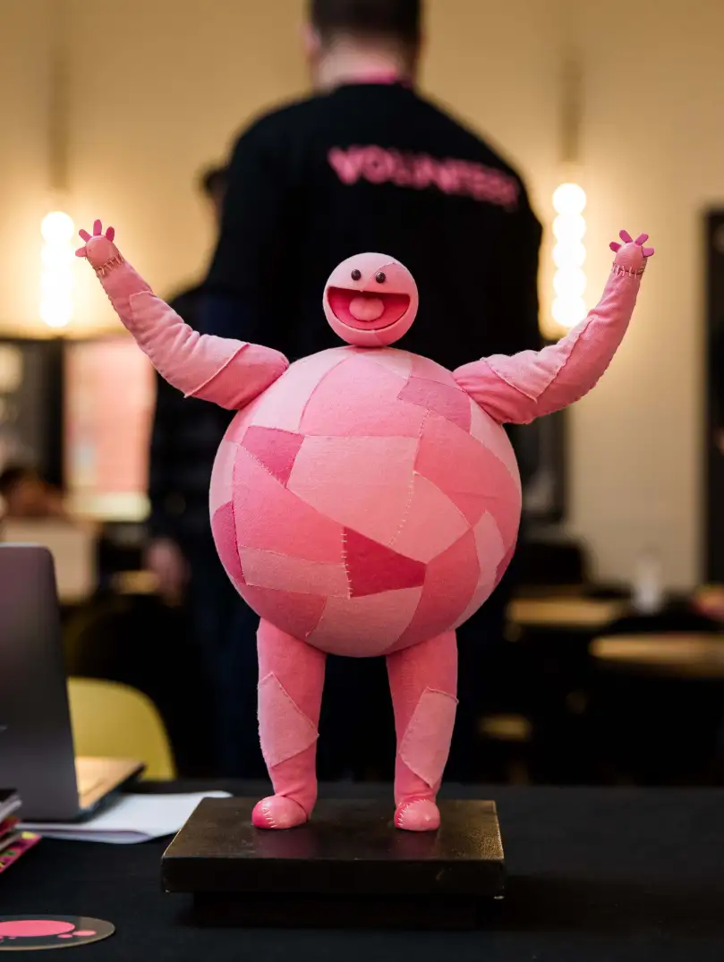 A model of a pink cartoonish creature on display at the Cardiff Animation Festival.