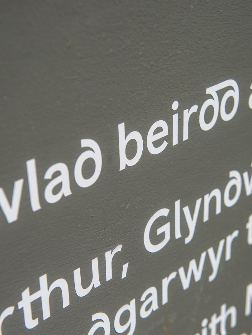 Close up of sign with words in Welsh.