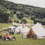 A view of the campsite at Camp VC, with tents and motorbikes