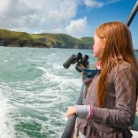 Girl looking out to sea Near New Quay, Dolphin watching, Ceredigion Heritage Coast