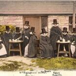 An old postcard showing Welsh women wearing traditional dress
