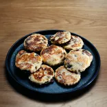 A beautifully presented plate of freshly cooked Welsh cakes